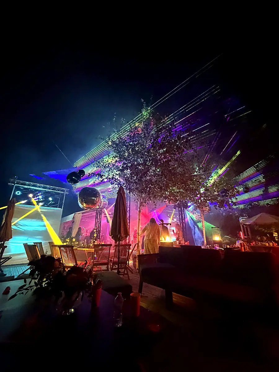 Mirror ball and colour wash over an outdoor party